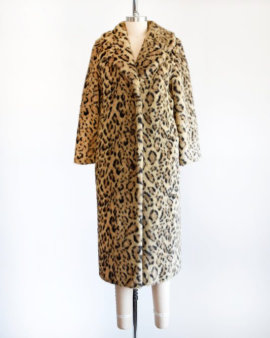 A vintage 1970s leopard print faux fur coat. 