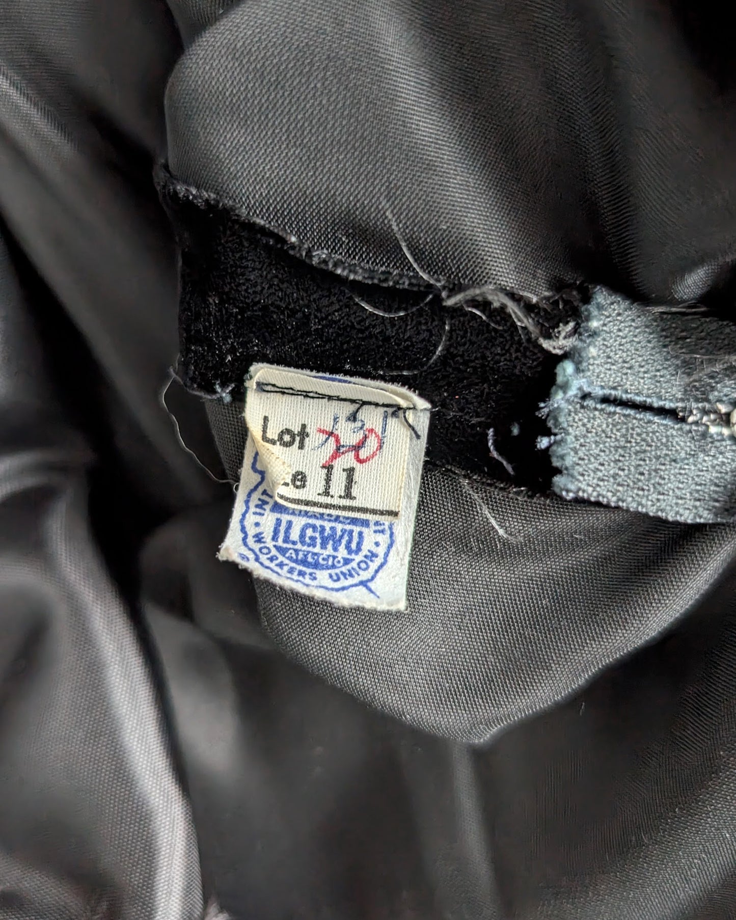 close up of the 1963-1974 union tag on the dress