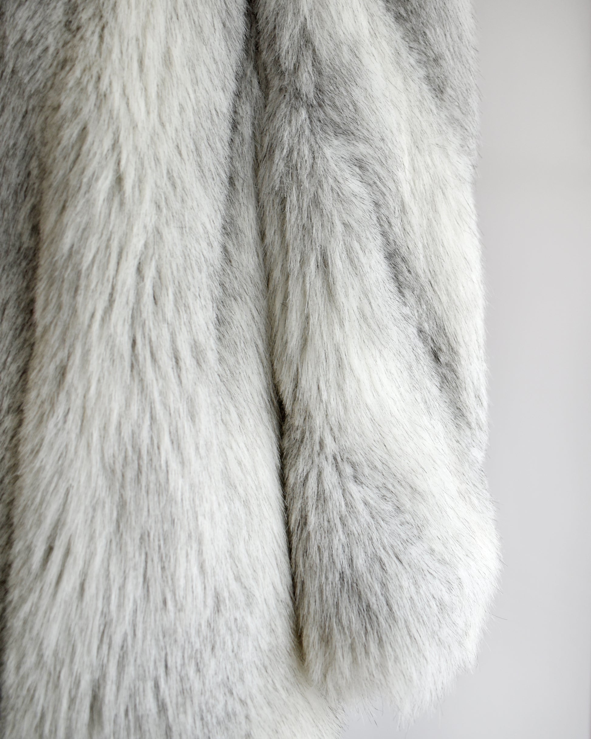 Close up of the sleeve, showing the faux fur texture and color