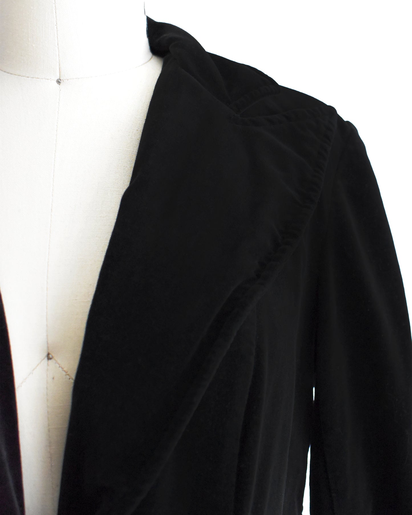 close up of the lapel on the black velvet blazer