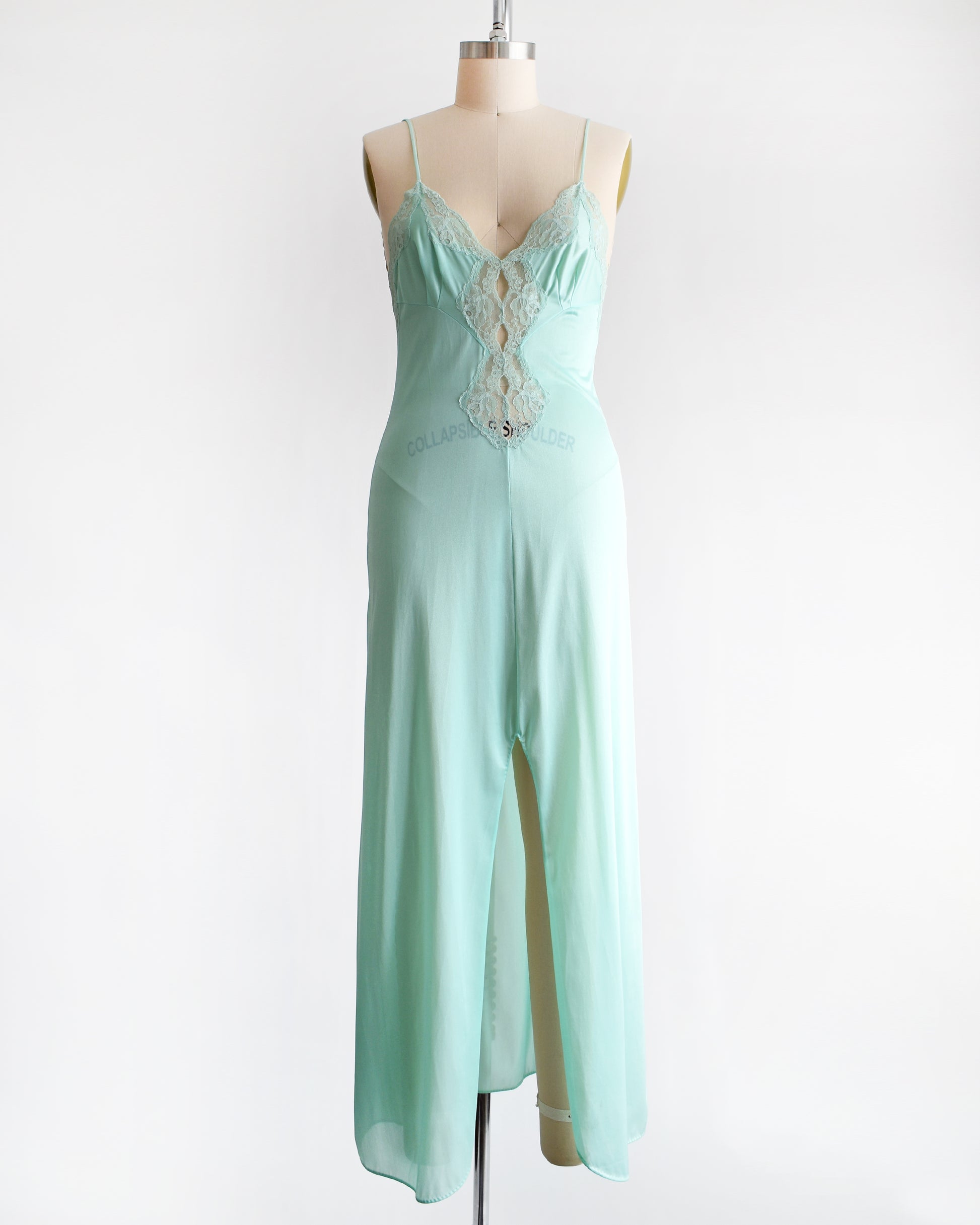 A vintage 1970s mint green lace nightgown