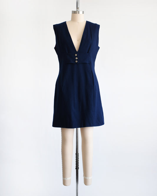 a vintage 1980s navy blue wool jumper dress