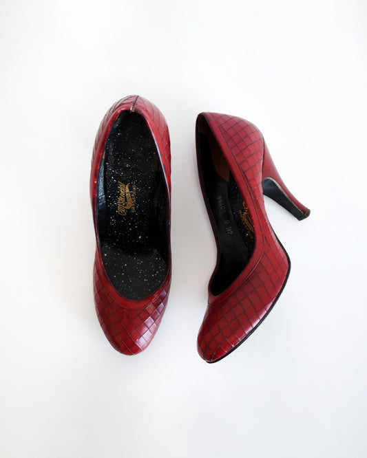 upper view of a pair of vintage 1960s burgundy criss-cross pattern high heels