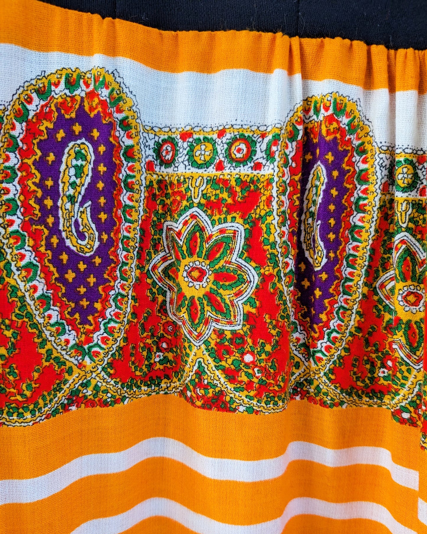 close up of the colorful patterned skirt