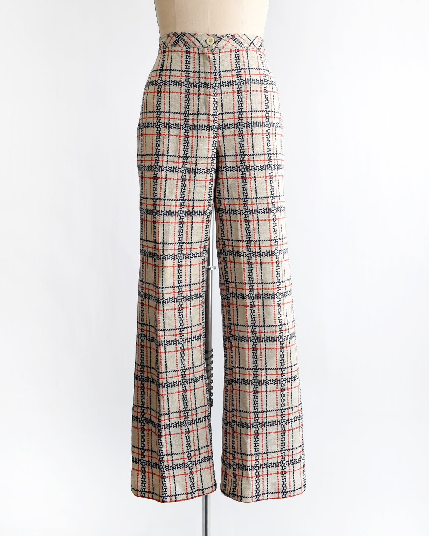 vintage 1970s plaid pants on a mannequin against a white background