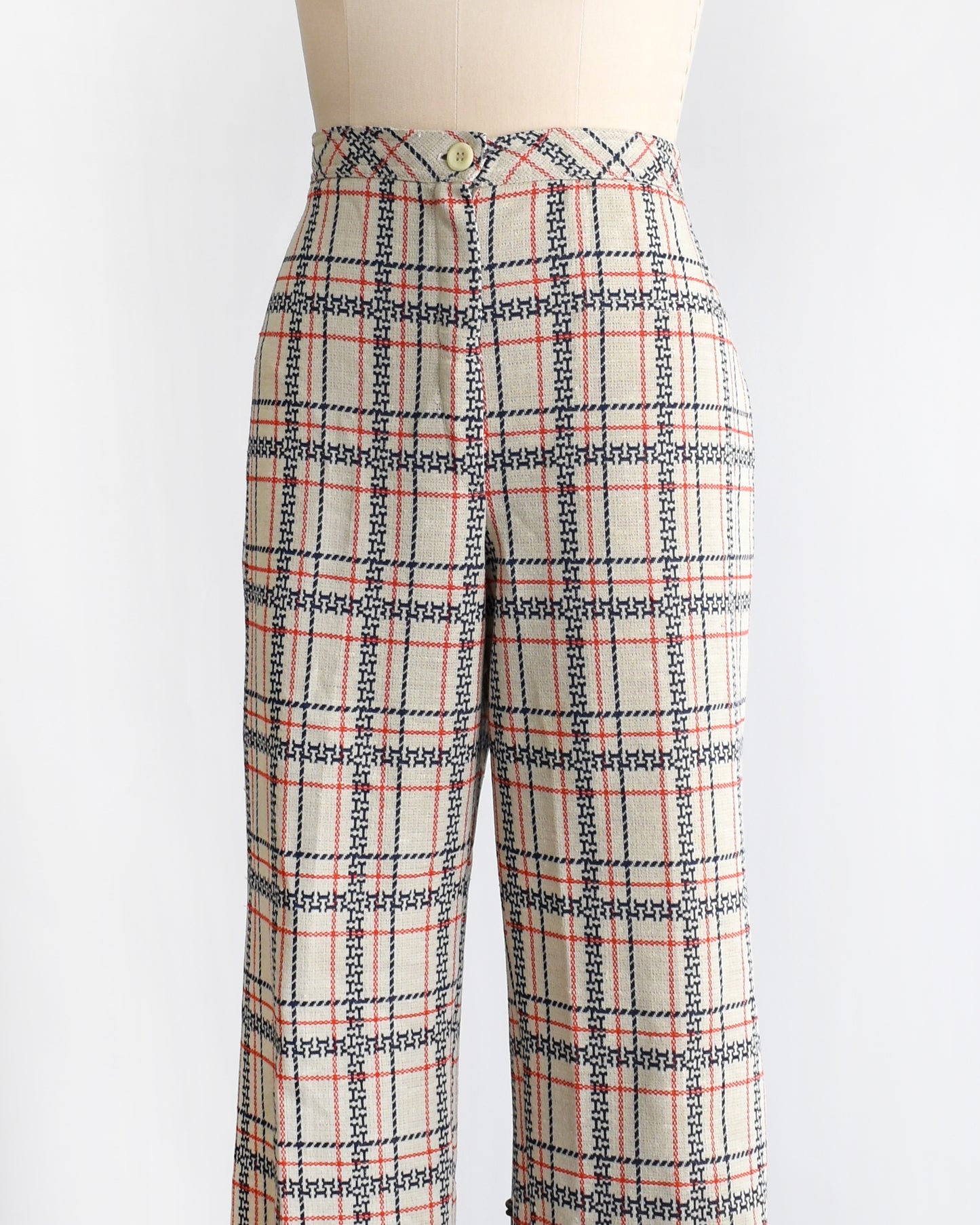 side front view of vintage 1970s plaid pants on a mannequin against a white background