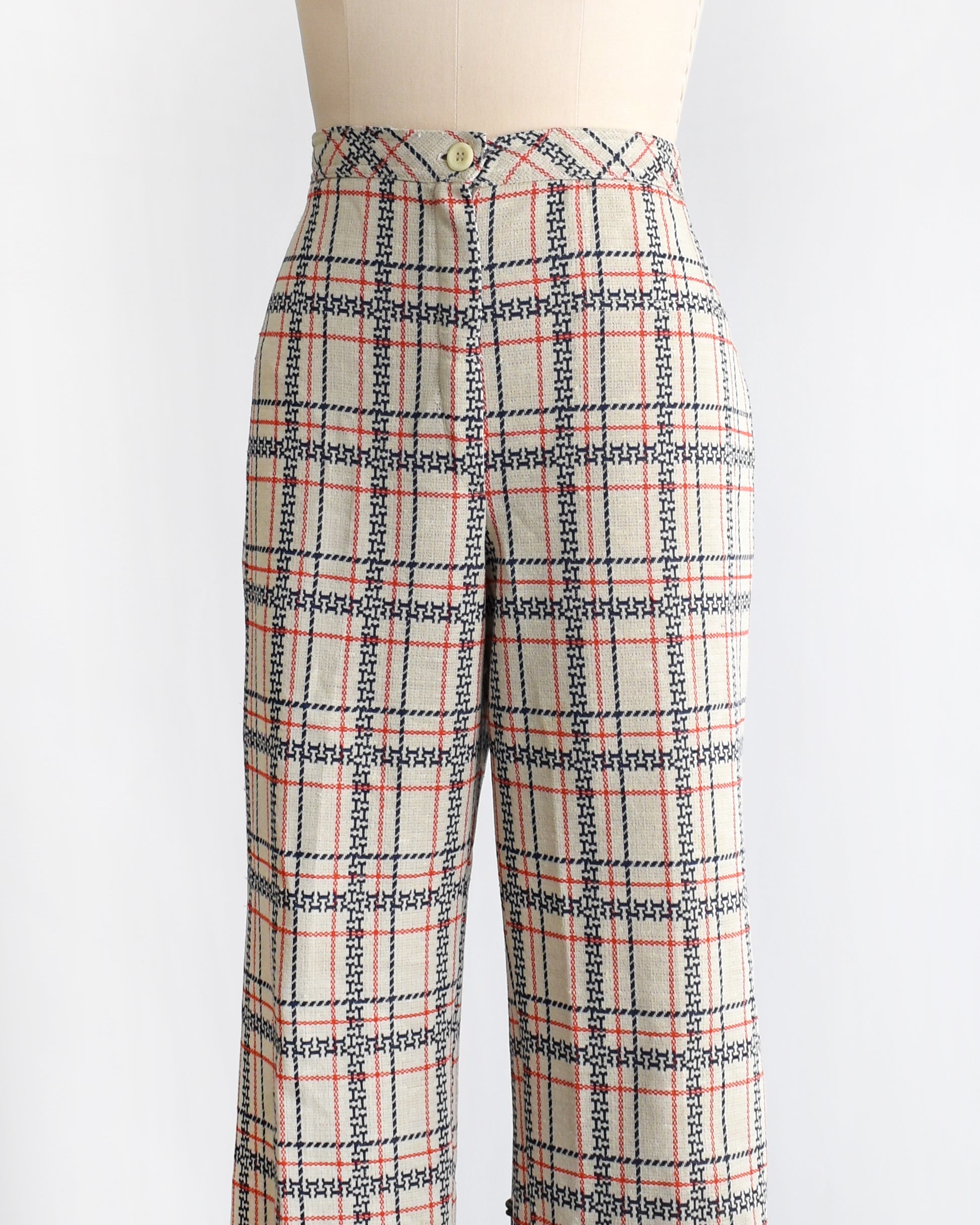 side front view of vintage 1970s plaid pants on a mannequin against a white background