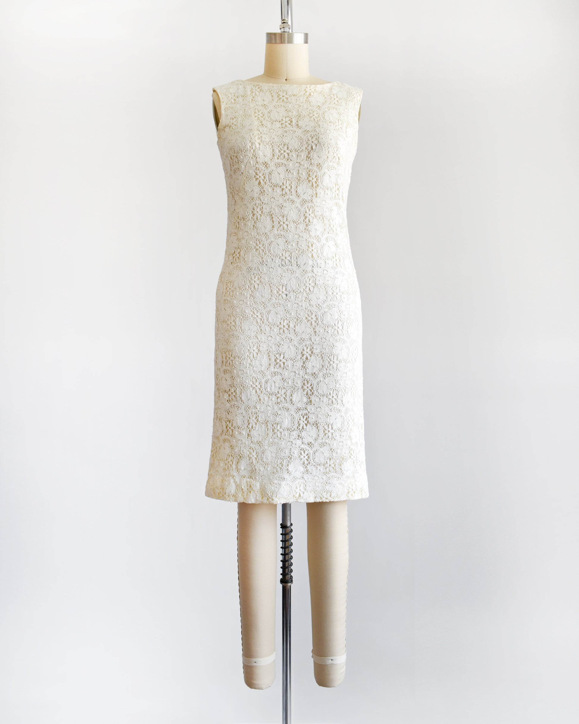a vintage 1960s floral cream lace dress
