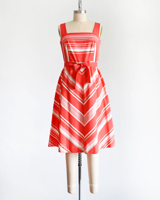a vintage 70s dark pink, white, and tan striped dress with matching tie belt by Malia Honolulu