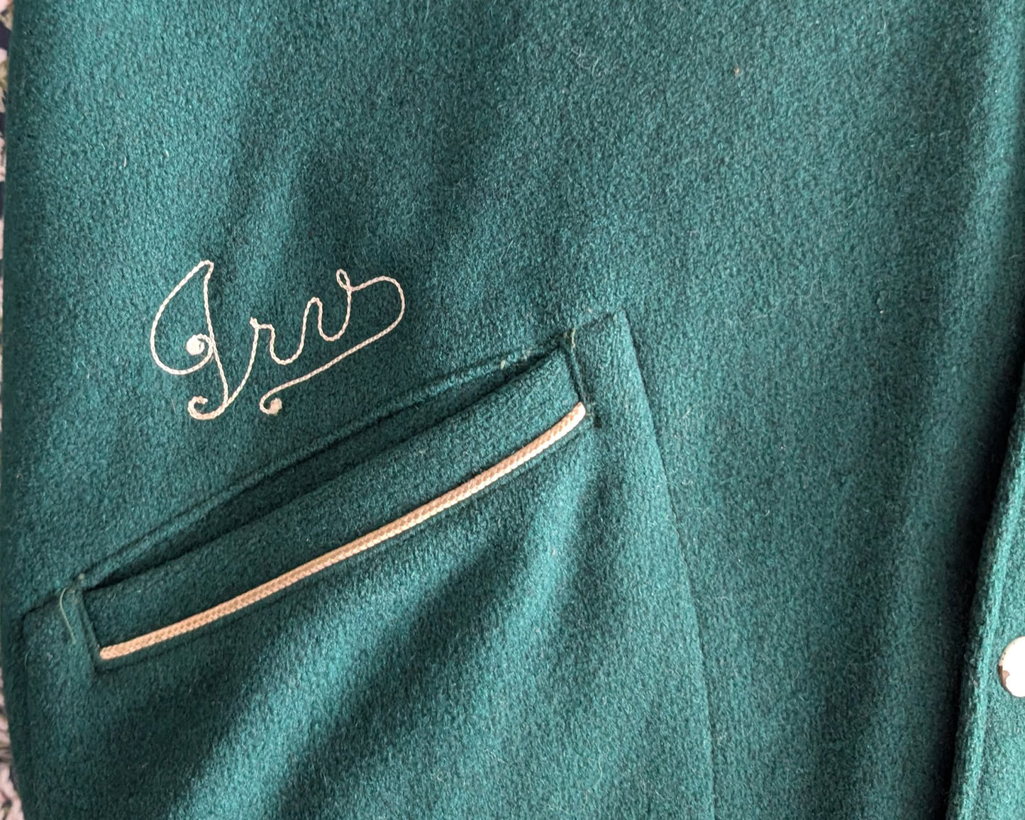 close up of the embroidered lettering on a pocket