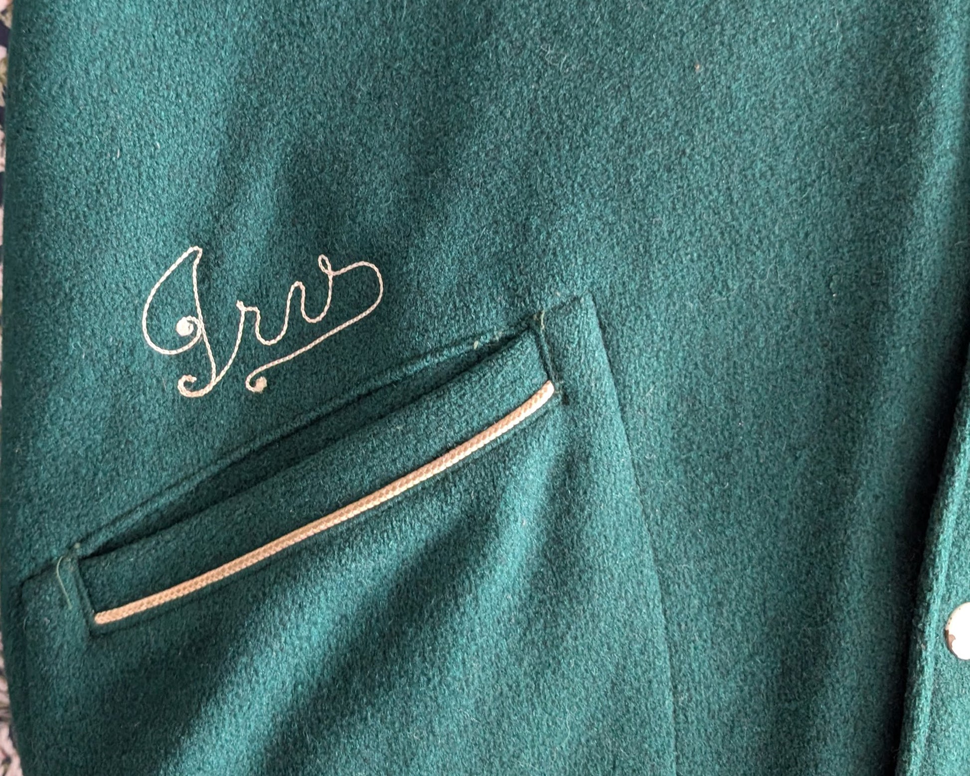 close up of the embroidered lettering on a pocket