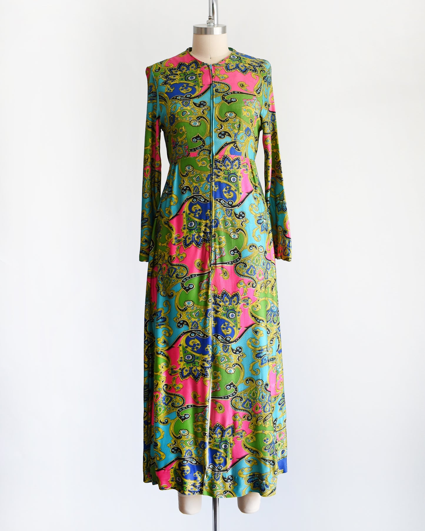 a vintage late 1960s early 1970s psychedelic paisley print maxi dress
