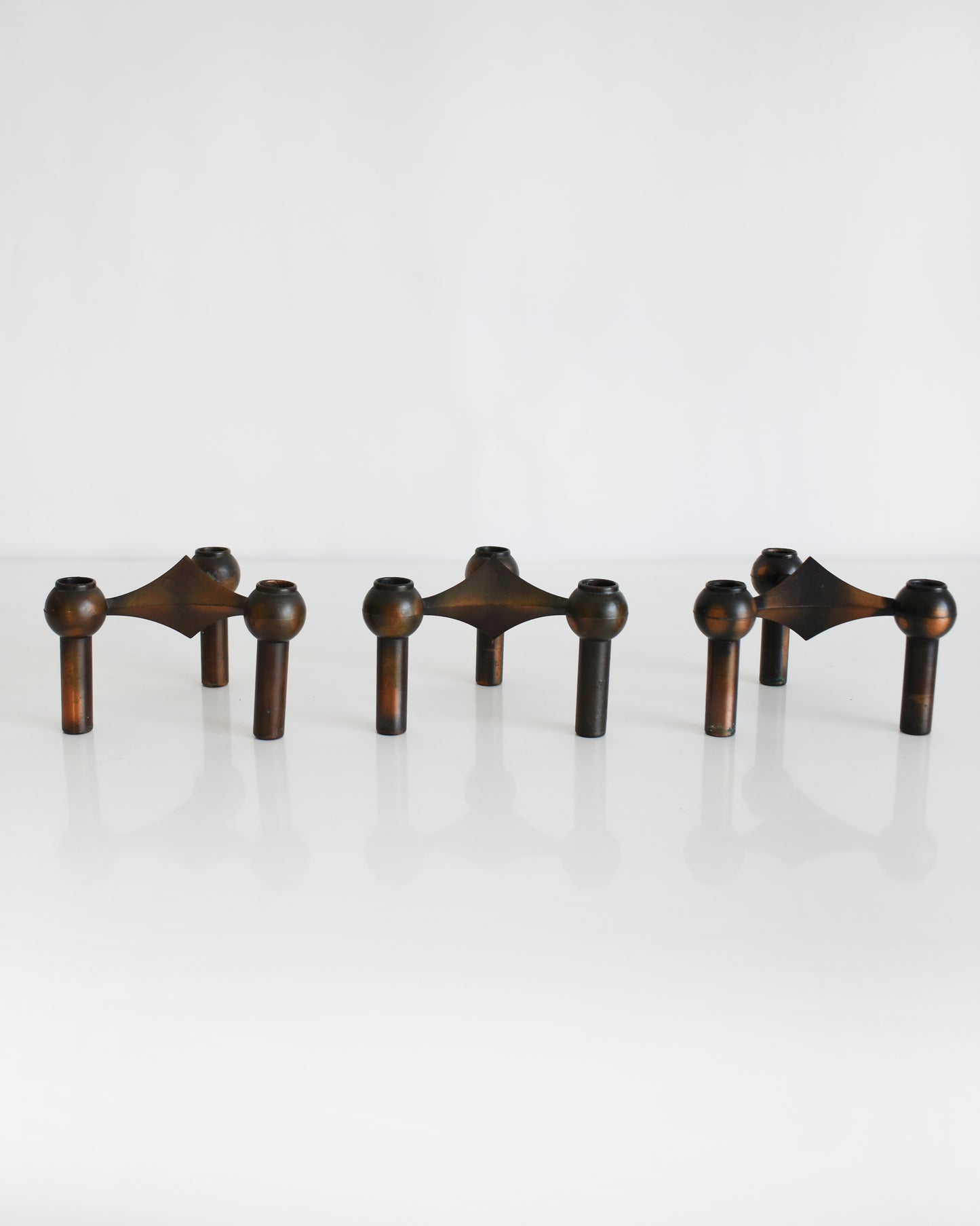 a set of three vintage late 1960s early 1970s modular candle holders