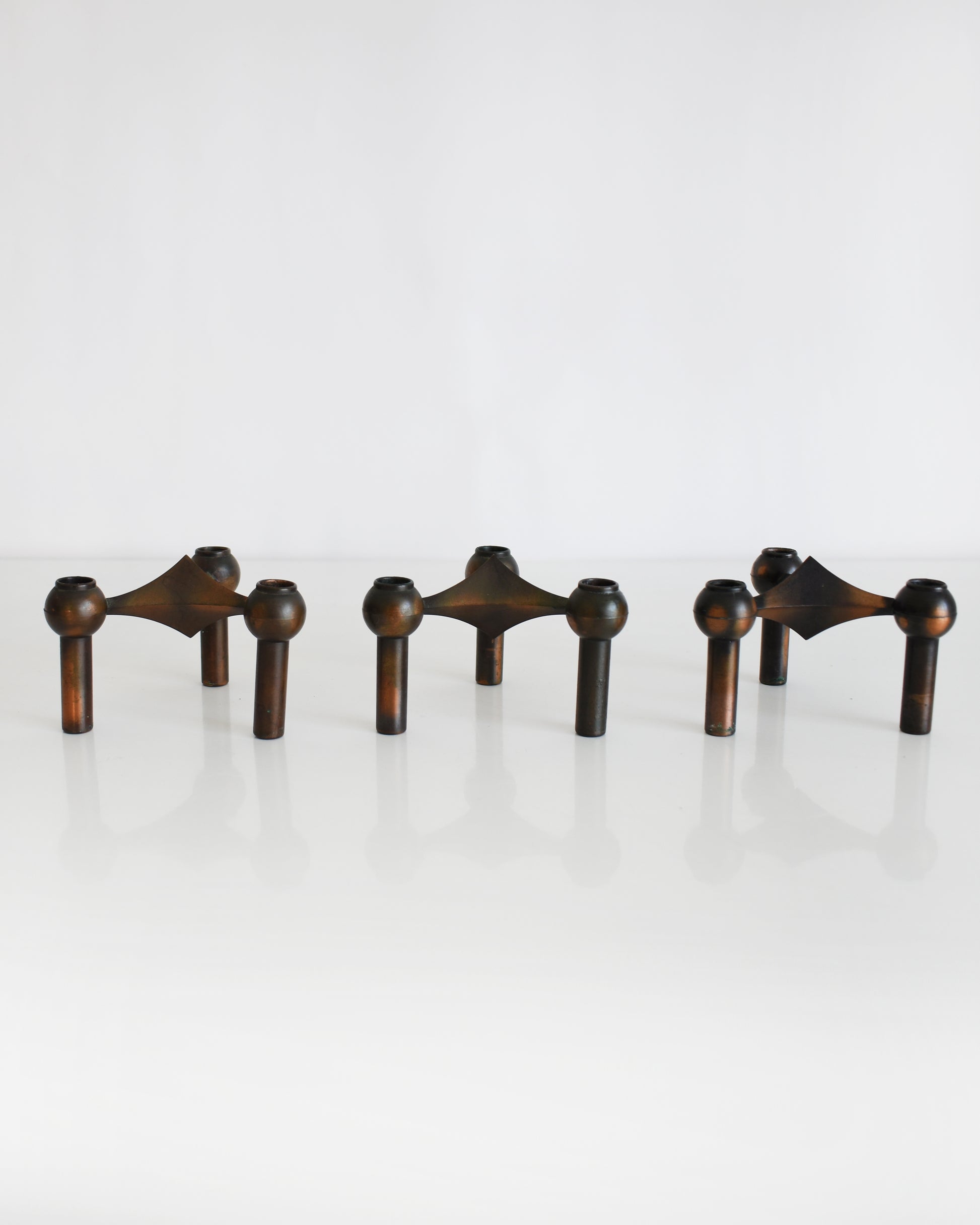 a set of three vintage late 1960s early 1970s modular candle holders