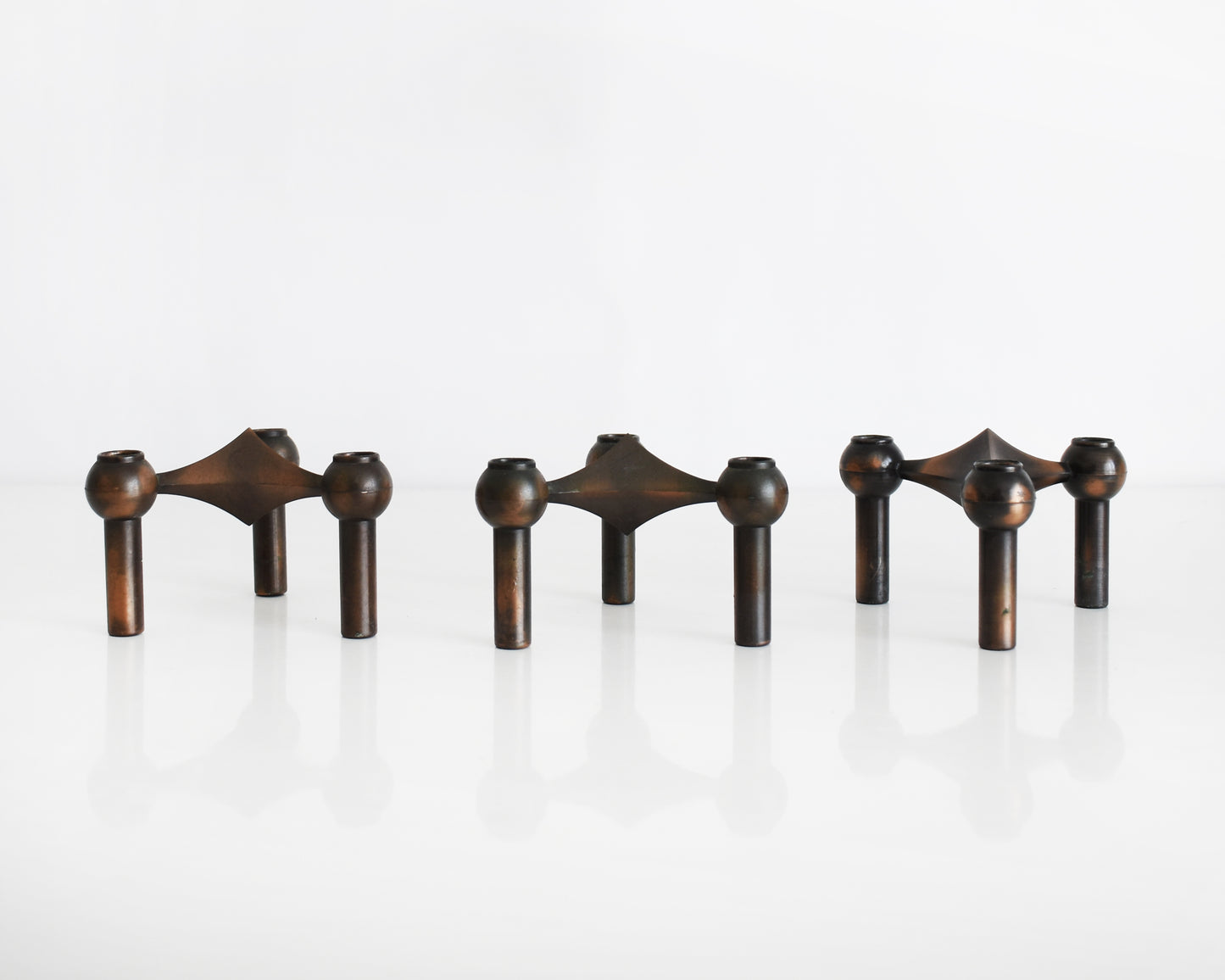 a set of three vintage late 1960s early 1970s modular candle holders