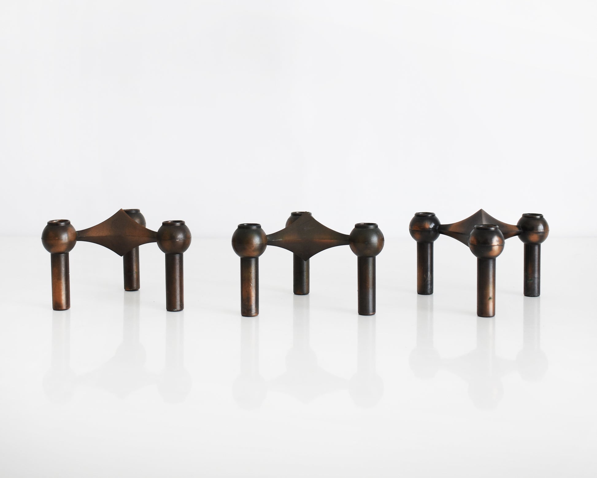 a set of three vintage late 1960s early 1970s modular candle holders