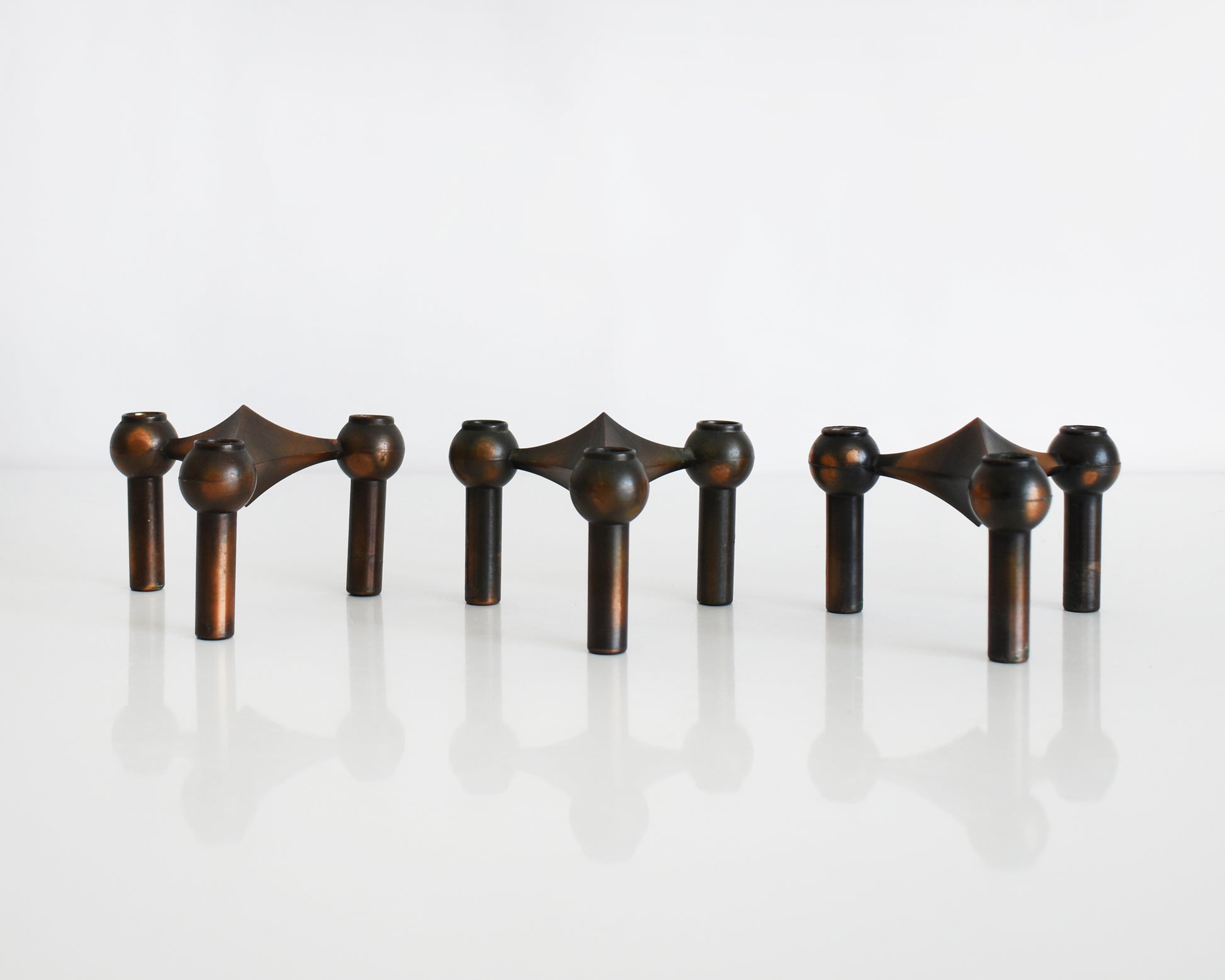 a set of three vintage late 1960s early 1970s modular candle holders