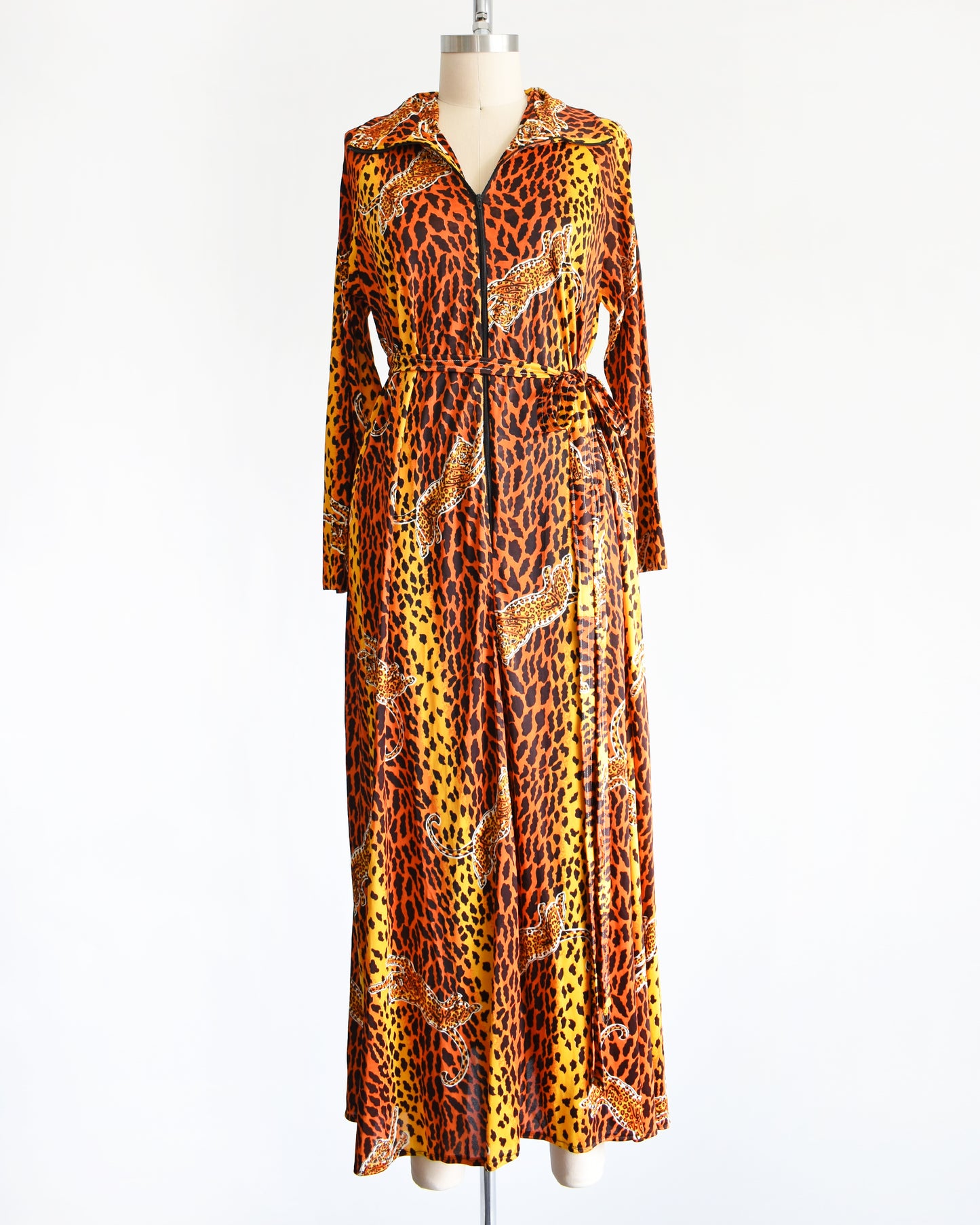 a vintage 1970s leopard print long sleeve lounge dress with matching tie belt