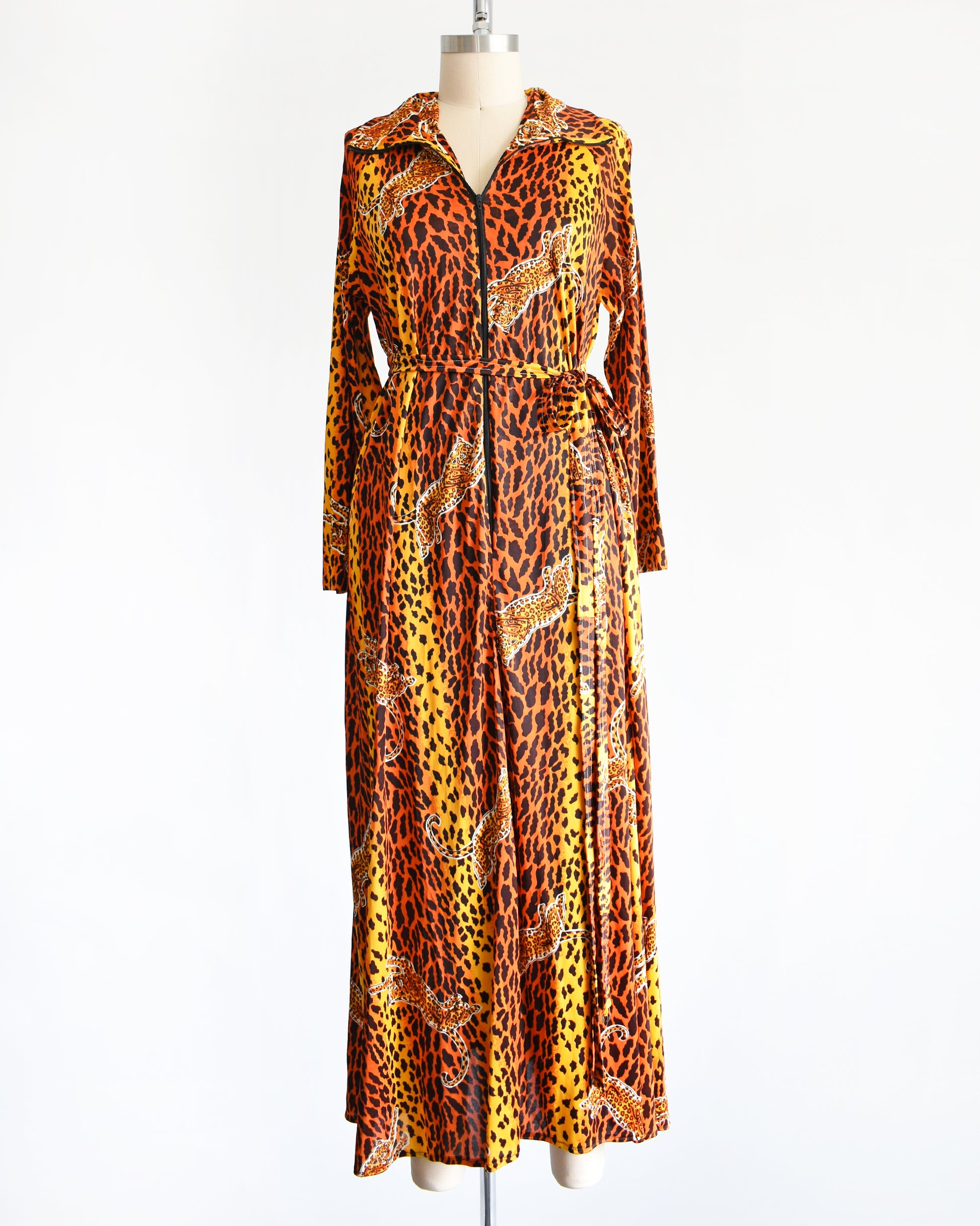 a vintage 1970s leopard print long sleeve lounge dress with matching tie belt