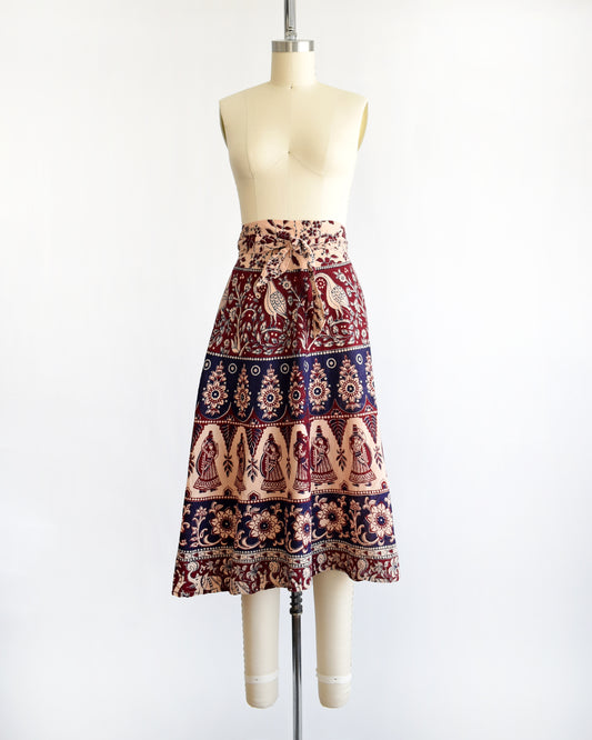 a vintage 1970s block print skirt on a mannequin against a white background