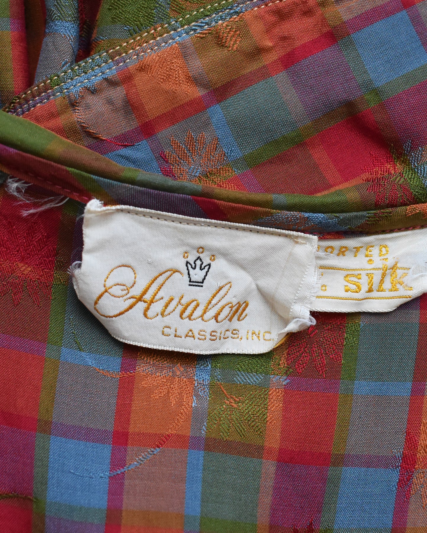 Colorful fabric with Avalon Classics, Inc. label