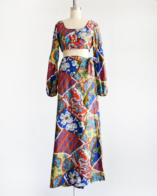 a vintage 1960s/1970s Hawaiian two piece crop top and maxi skirt set by Kahala. 