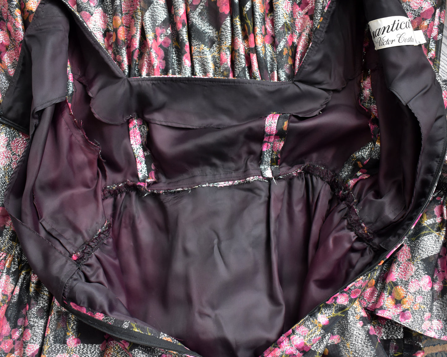 an overhead shot showing the lining of the dress that has changed color throughout the years