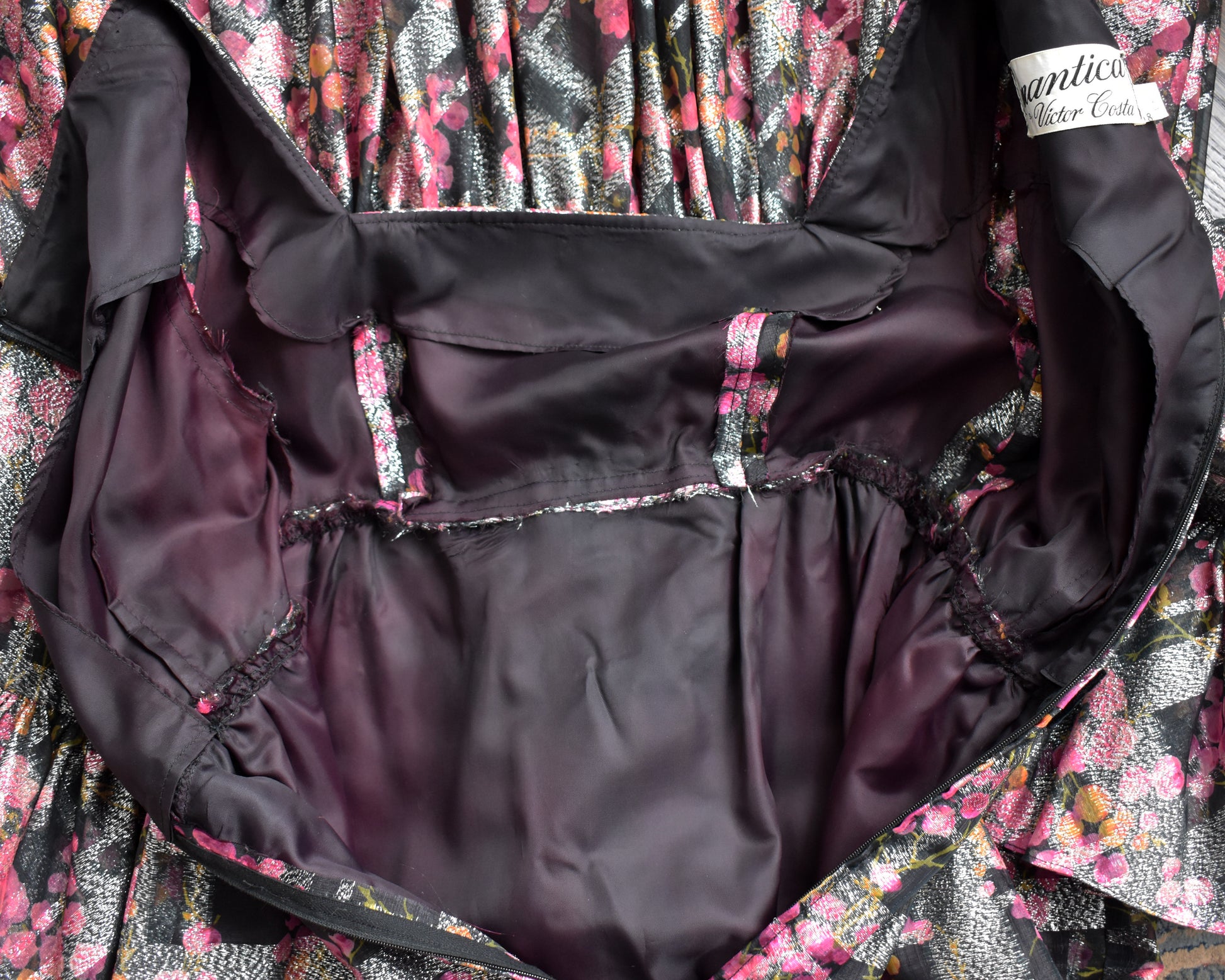 an overhead shot showing the lining of the dress that has changed color throughout the years