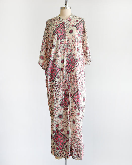 a vintage 1970s pink and white flower power caftan