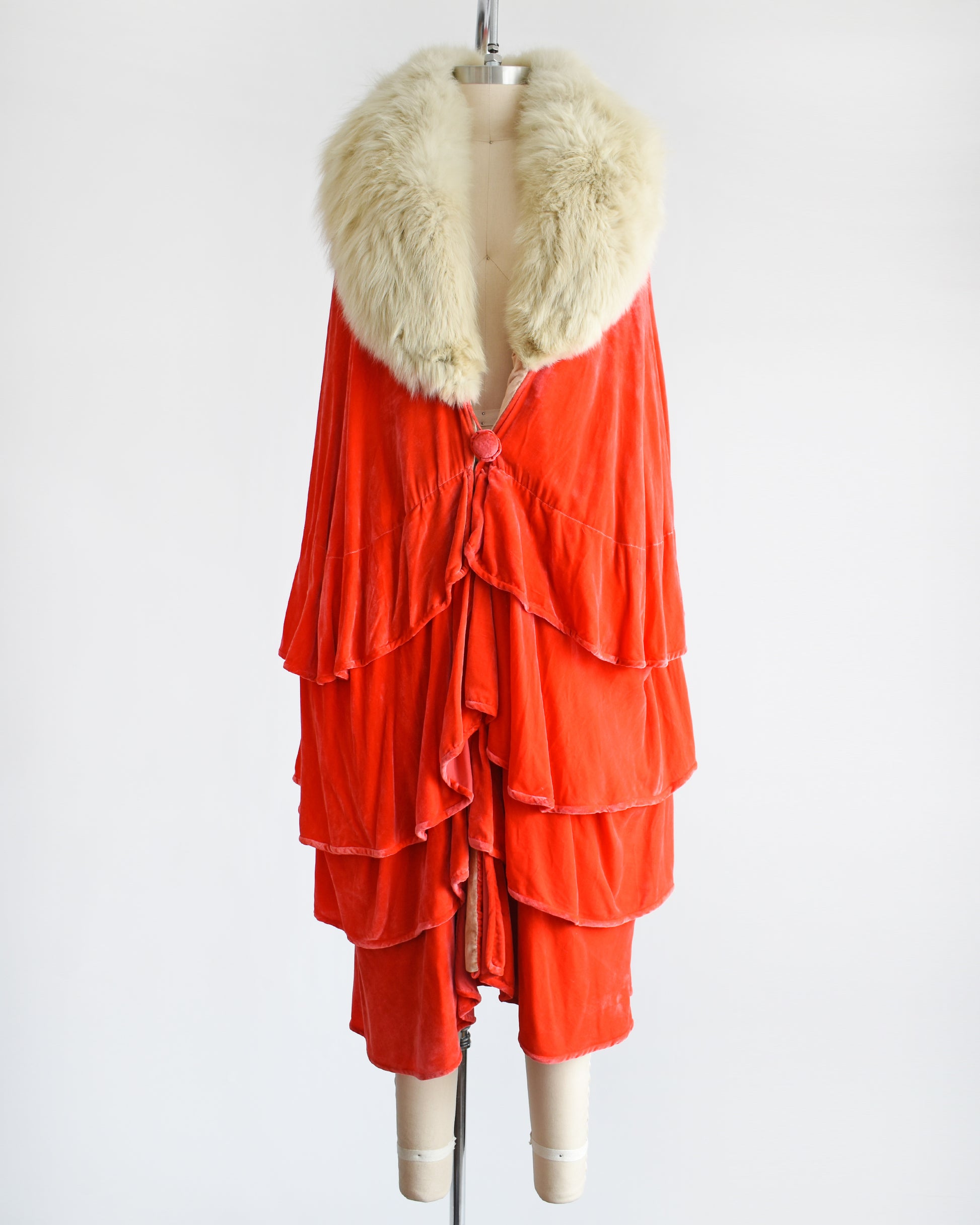 A vintage 1920s ruffled silk velvet opera coat with cream fox fur trim