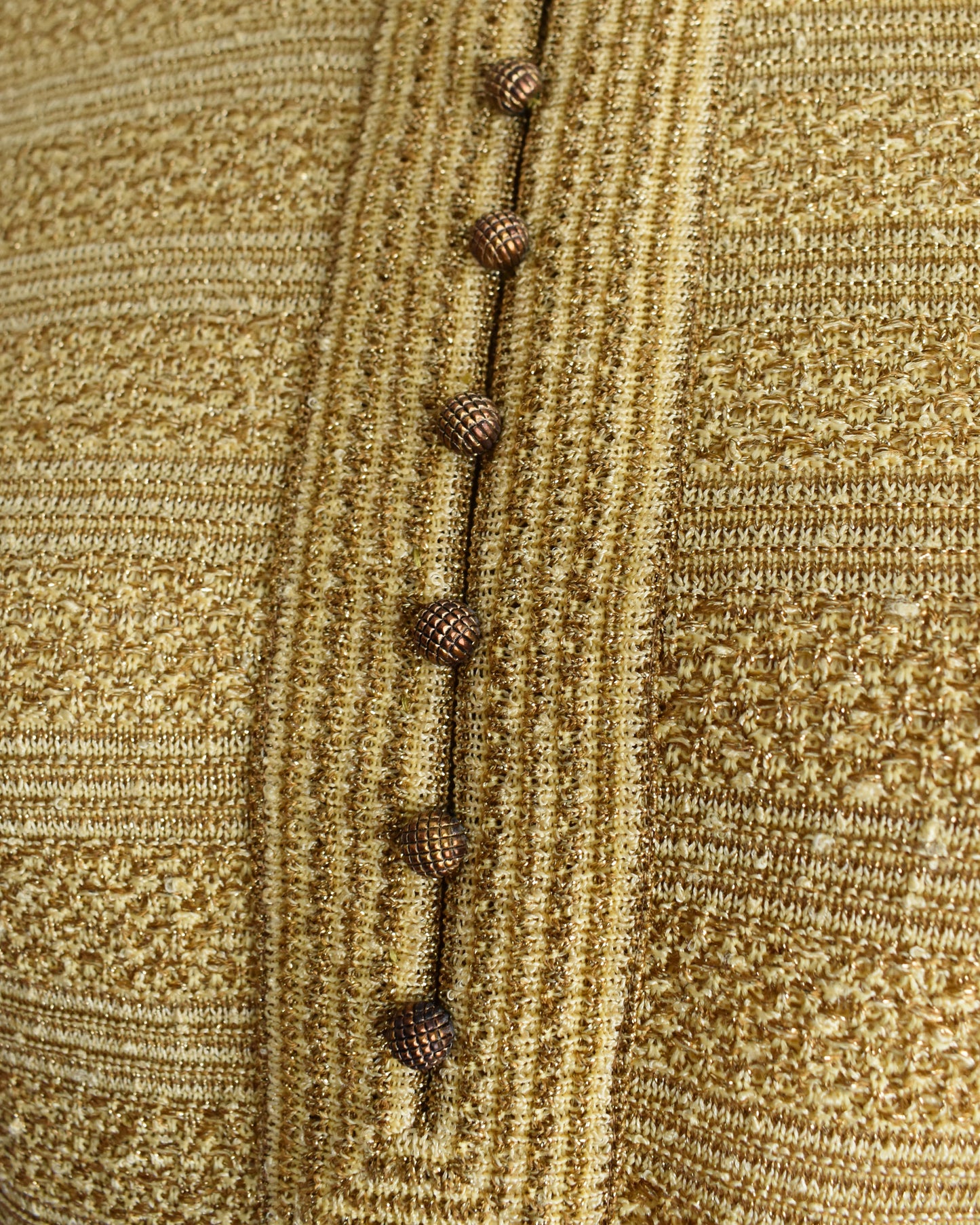 Close-up of a textured fabric with button details