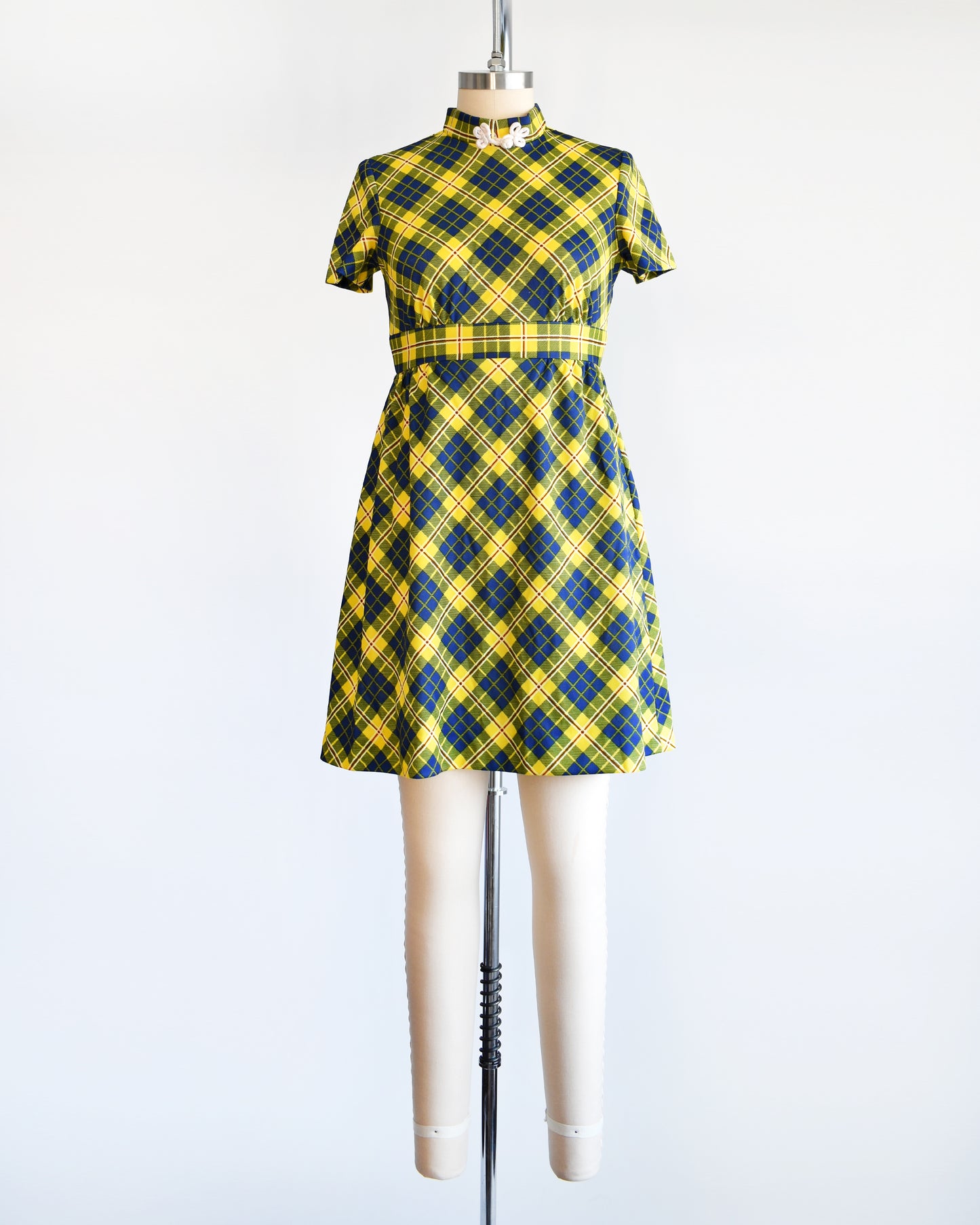 A yellow and blue plaid mod mini dress