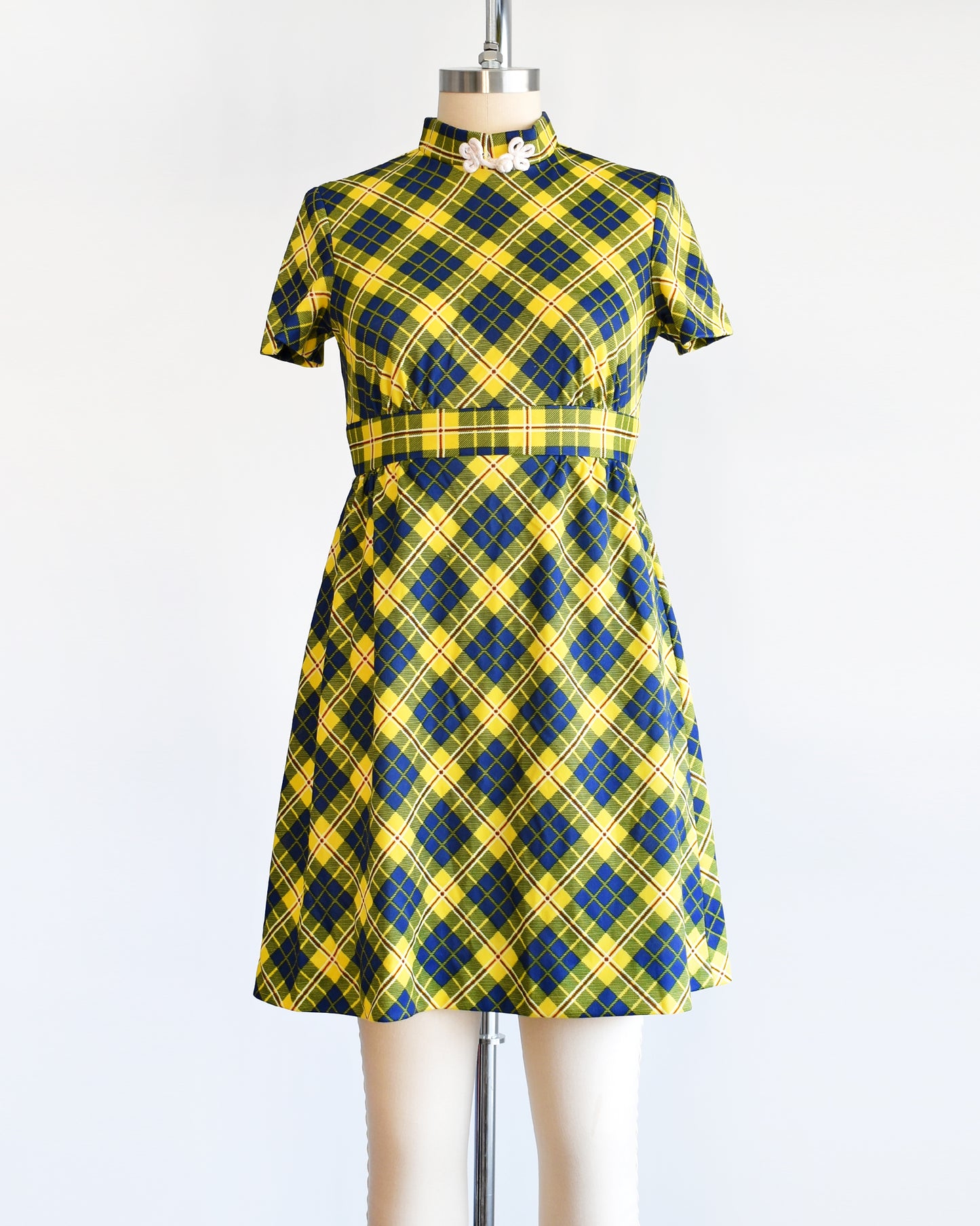 A yellow and blue plaid mod mini dress