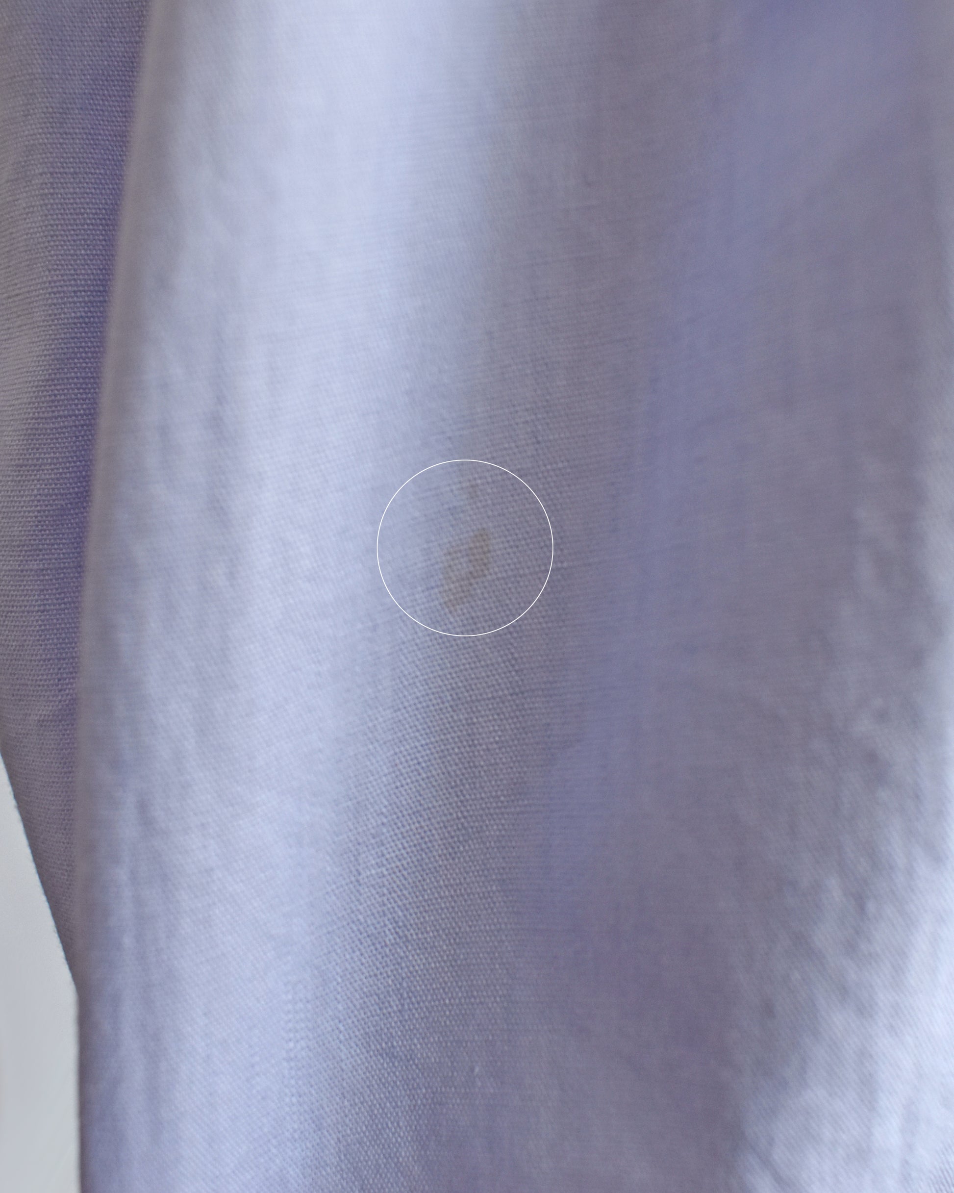 close up of a small mark on the back of the dress