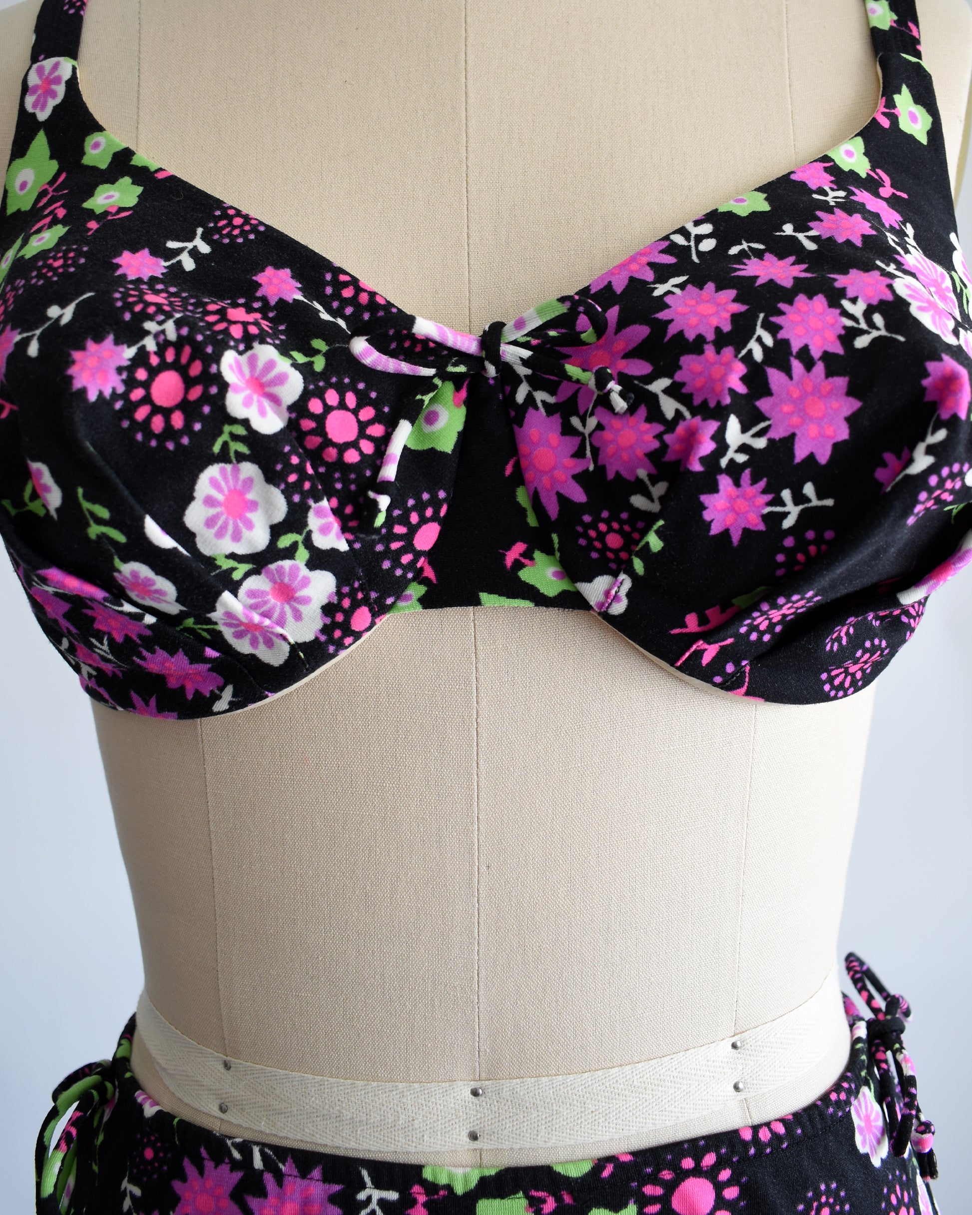 close up of the bow on the center of the bikini