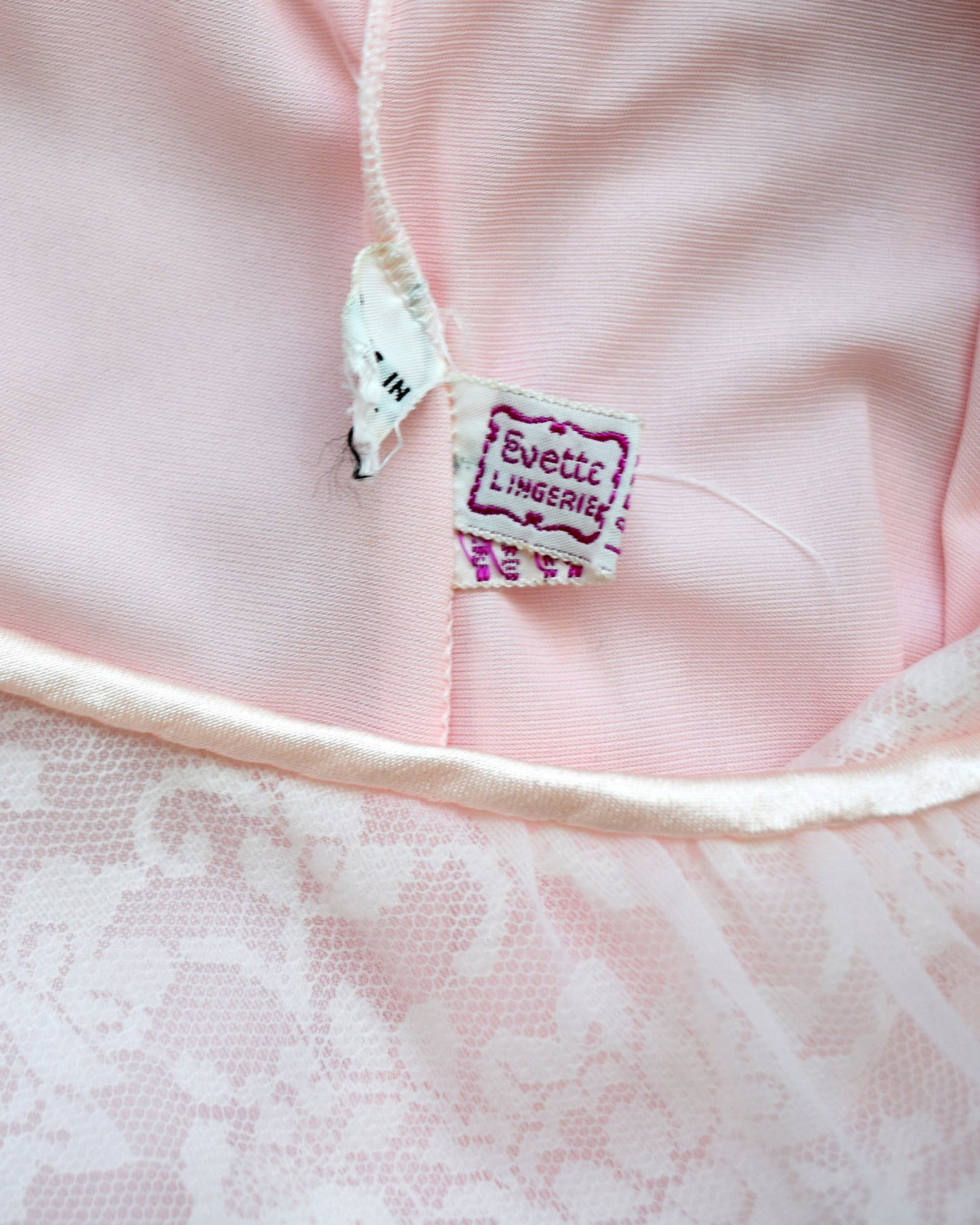 close up of the tag which says Evette Lingerie