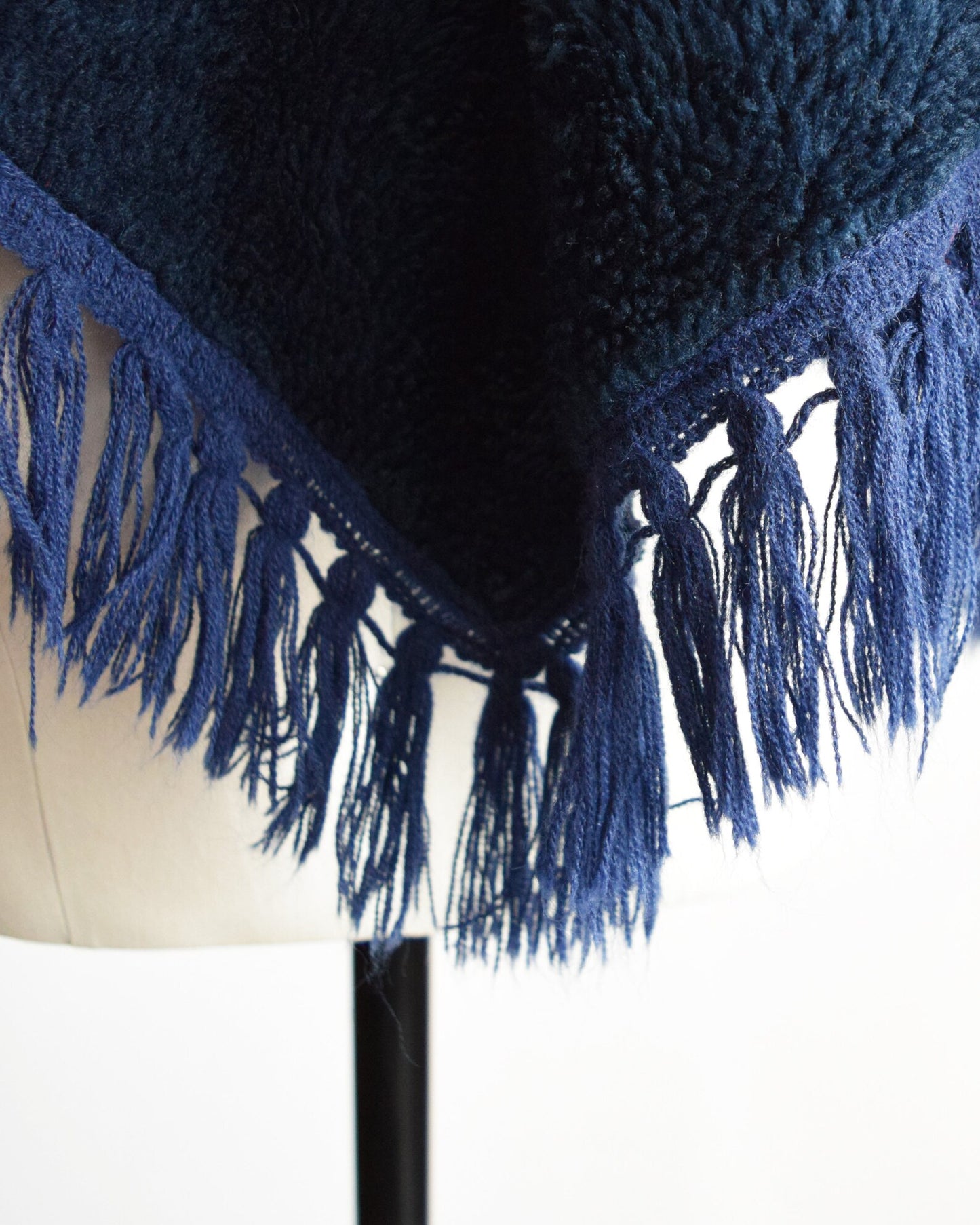 Close up of the fringe along the hem