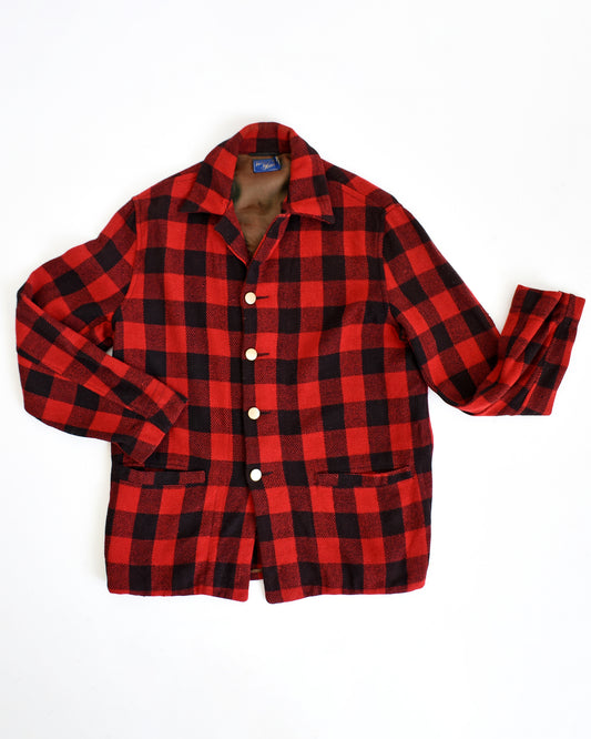 A photo of a vintage 40s red and black plaid jacket on a white background. The jacket has gold buttons down the front.